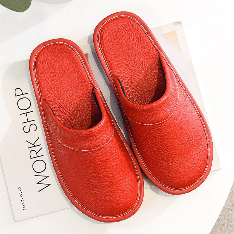 Robuste Lederpantoffeln für Damen und Herren, elegant und langlebig, in Blau, Braun, Orange, Rosa, Rot und Schwarz.