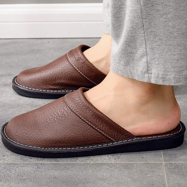 Robuste Lederpantoffeln für Damen und Herren, elegant und langlebig, in Blau, Braun, Orange, Rosa, Rot und Schwarz.