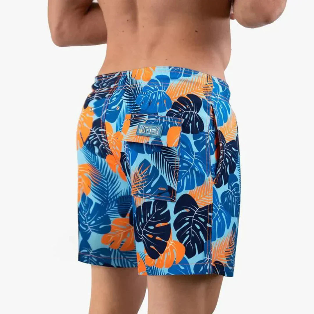 "Schnell trocknende Herren Badehose Dario, modischer Schnitt, blaue Farbe, mit Taschen, ideal für Strand und Pool."
