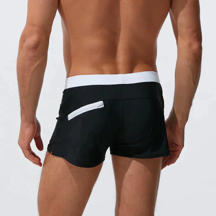 "Schnelltrocknende Herren Badeshorts mit Kordelzug, wasserdicht, blau, ideal für Strand- und Wasseraktivitäten."