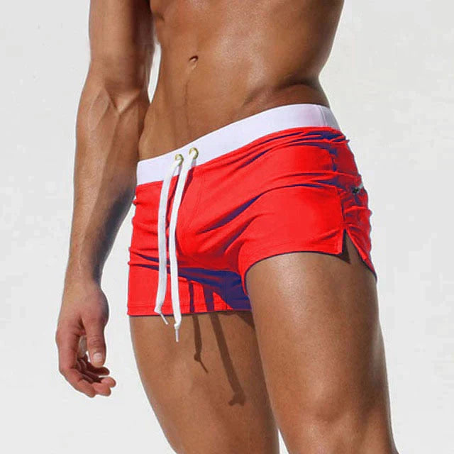 "Schnelltrocknende Herren Badeshorts mit Kordelzug, wasserdicht, blau, ideal für Strand- und Wasseraktivitäten."