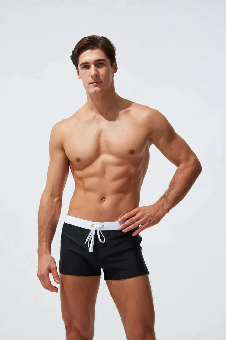 "Schnelltrocknende Herren Badeshorts mit Kordelzug, wasserdicht, blau, ideal für Strand- und Wasseraktivitäten."