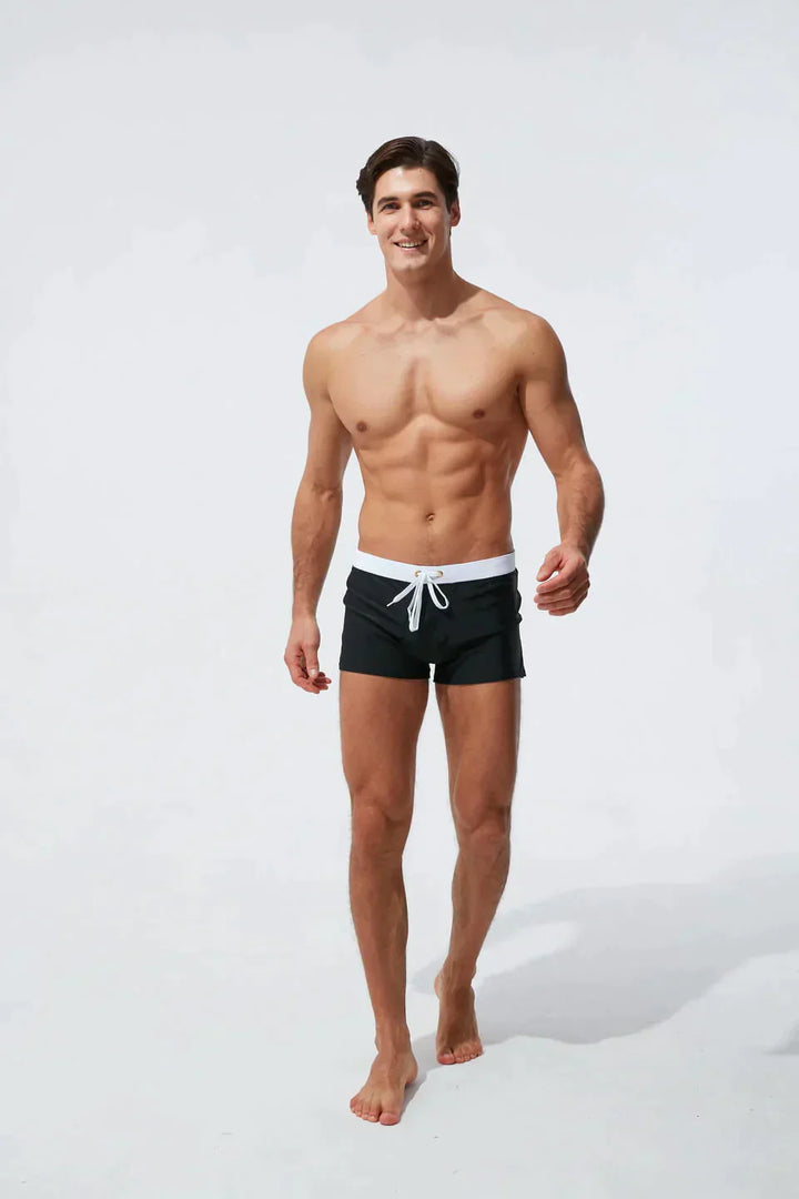 "Schnelltrocknende Herren Badeshorts mit Kordelzug, wasserdicht, blau, ideal für Strand- und Wasseraktivitäten."