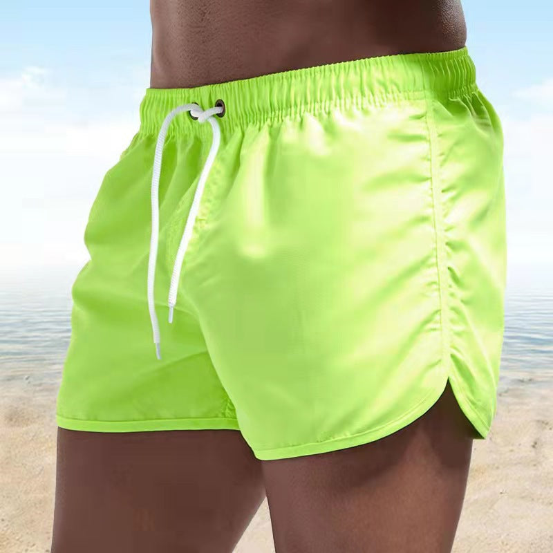 "Schnelltrocknende Herren Badeshorts mit verstellbarem Bund, stilvollem Design und praktischer Tasche, ideal für den Strand."