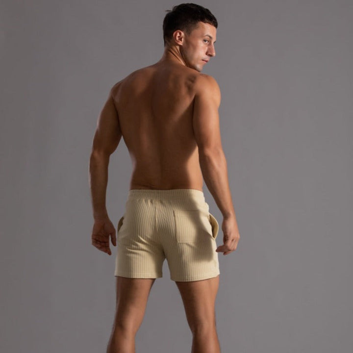 "Schnelltrocknende Herren Badeshorts Ripstop-Polyester in Blau, kurzer Schnitt, elastischer Bund, Frontansicht"