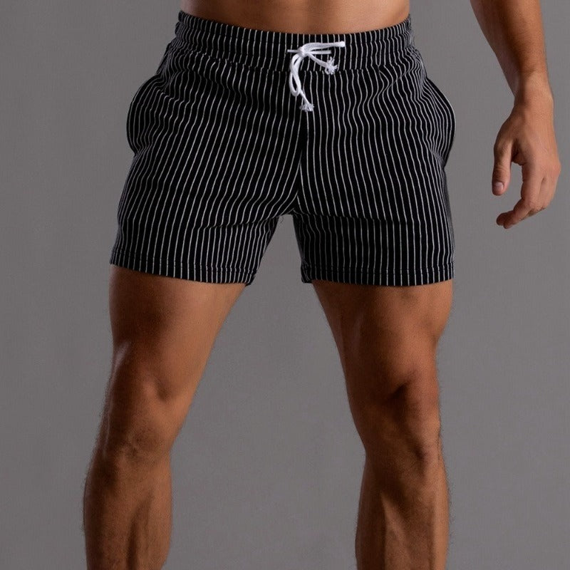 "Schnelltrocknende Herren Badeshorts Ripstop-Polyester in Blau, kurzer Schnitt, elastischer Bund, Frontansicht"