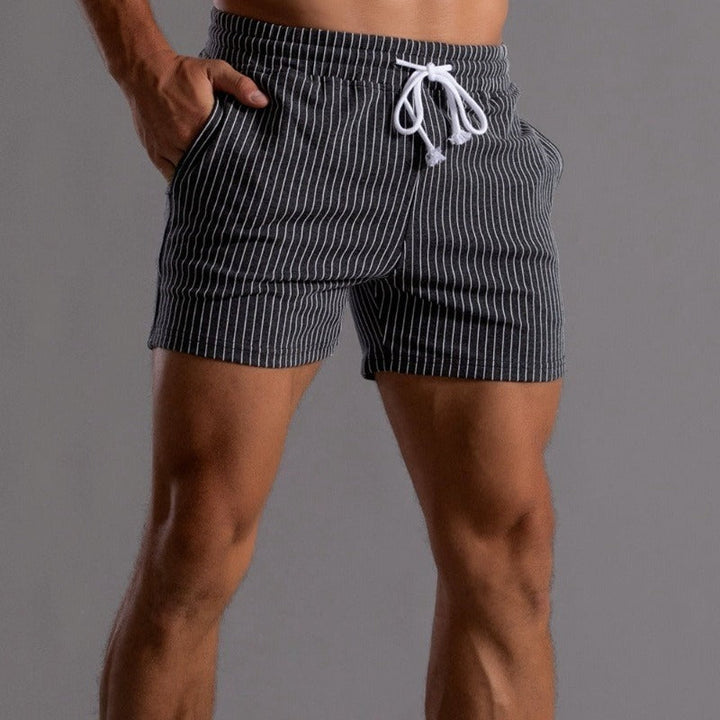 "Schnelltrocknende Herren Badeshorts Ripstop-Polyester in Blau, kurzer Schnitt, elastischer Bund, Frontansicht"