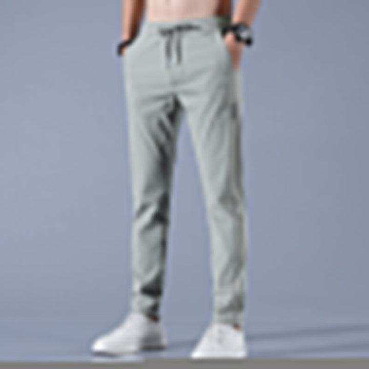 "Schnelltrocknende Herren Stretch-Hose, atmungsaktiv, leicht, mit Kordelzug und Seitentaschen, ideal für Sommeraktivitäten."