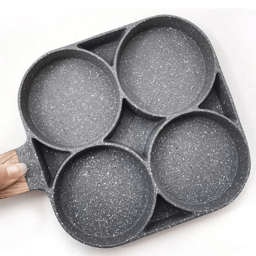 "Schwarze Multifunktionspfanne mit 4-in-1-Funktion und Antihaftbeschichtung für vielseitiges Kochen auf allen Herdarten"