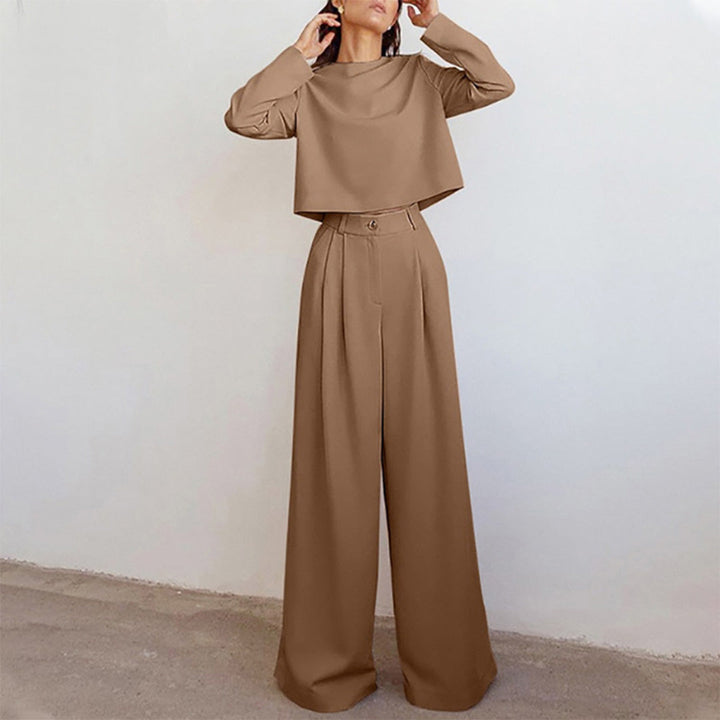 Schwarzes elegantes Damen-Zweiteiliges Set aus Hose und Oberteil, ideal für formelle und alltägliche Anlässe.