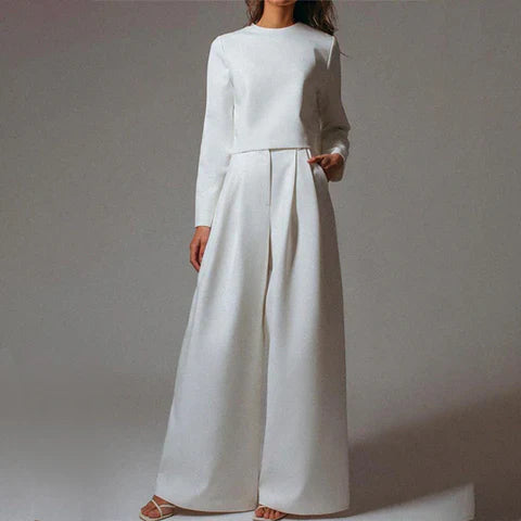 Schwarzes elegantes Damen-Zweiteiliges Set aus Hose und Oberteil, ideal für formelle und alltägliche Anlässe.