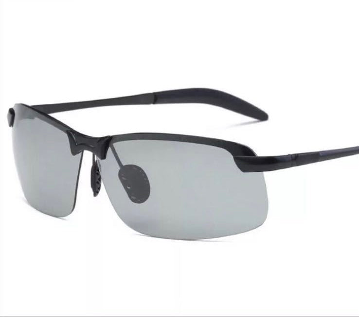 Selbsttönende Polarisationsbrille, schwarz, mit metallischem Rahmen, ideal bei Sonnenlicht, UV400-Schutz, polarisiert.