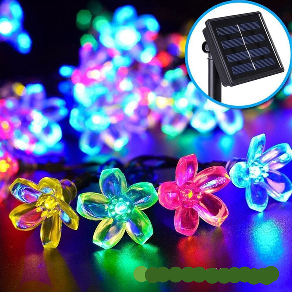 "Solar Gartenlichterkette in Blumenform, wetterfest, elegantes Ambiente, ideal für Gartenpartys und Outdoor-Nutzung."