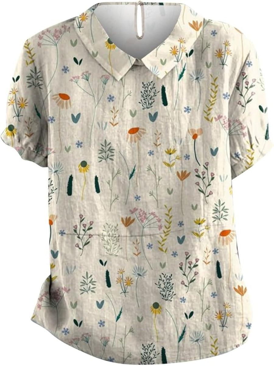 "Sommerbluse mit Wildblumenmuster, pastellfarben, locker geschnitten, ideal für warme Tage; Damenmode, stilvoll und bequem."