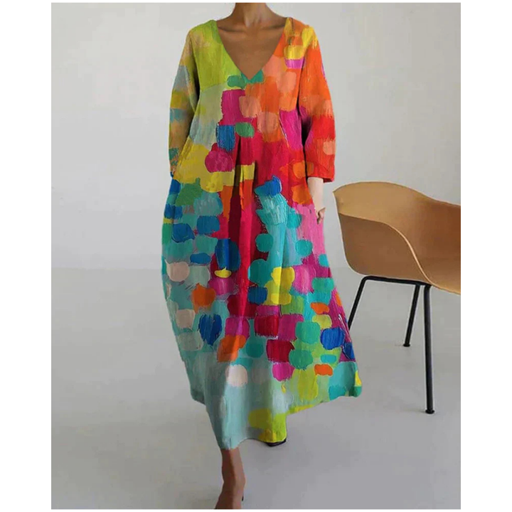 Sommerkleid mit V-Ausschnitt, florales Muster, 3/4-Ärmel, leichtes Material, ideal für Gartenparty und Sommerausflug.