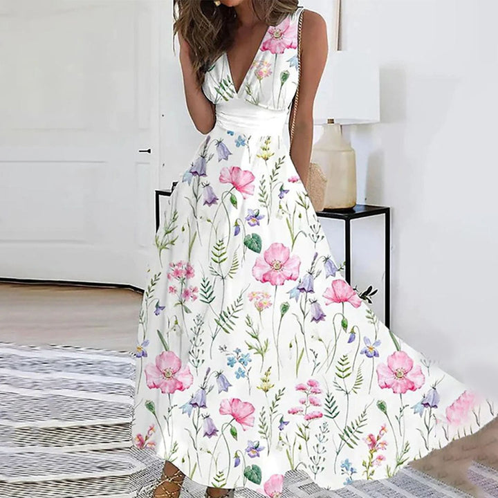 Sommerliches Damen Maxi-Kleid mit V-Ausschnitt und Blumenmuster, fließend und bequem für warme Tage.