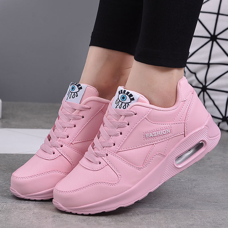 "Stilvolle Damen Sneaker aus veganem Leder mit dicker Luftsohle und Kunstleder-Details, modern und bequem."