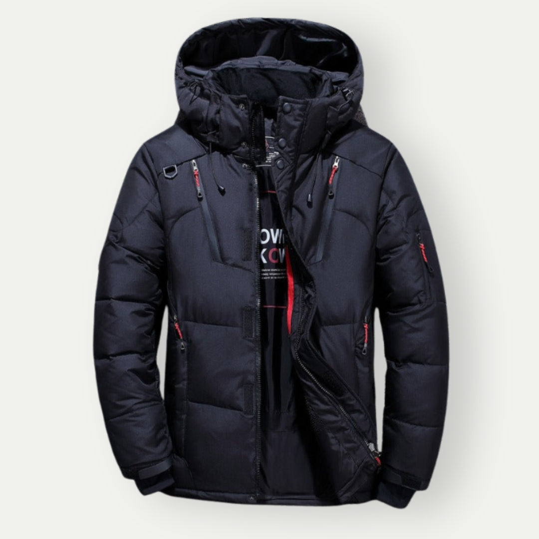 Stilvolle Herren Daunenjacke, farbenfroh in Blau, Grau, Grün, mit eleganter Silhouette und funktionaler Isolierung.