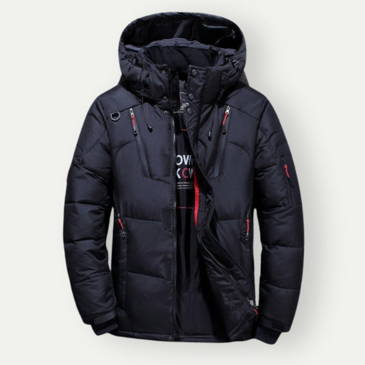 Stilvolle Herren Daunenjacke, farbenfroh in Blau, Grau, Grün, mit eleganter Silhouette und funktionaler Isolierung.