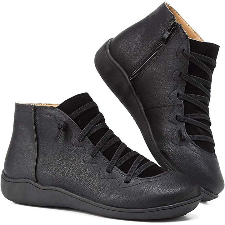 Stilvolle und bequeme orthopädische Stiefeletten für Damen, ideal für Alltag und formelle Anlässe, in hochwertigem Design.