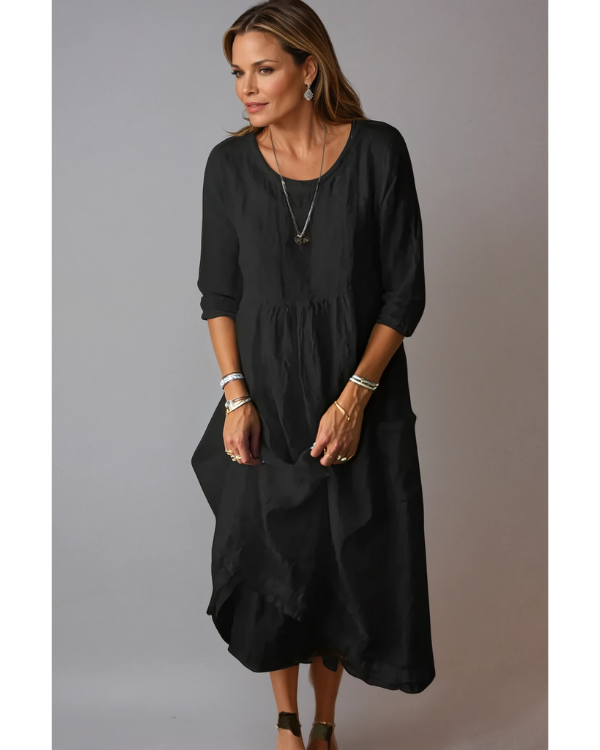 Stilvolles Midi-Damenkleid mit 3/4-Ärmeln, eleganter Passform und Rundhalsausschnitt, perfekt für vielseitige Anlässe.