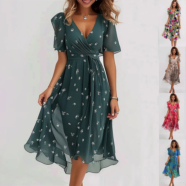 Stilvolles Midi Kleid mit Blumenmuster, elegante Passform, ideal für jeden Anlass, komfortabel und zeitlos.