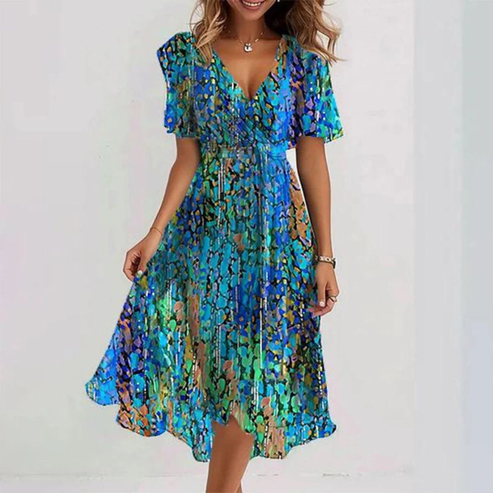 Stilvolles Midi Kleid mit Blumenmuster, elegante Passform, ideal für jeden Anlass, komfortabel und zeitlos.