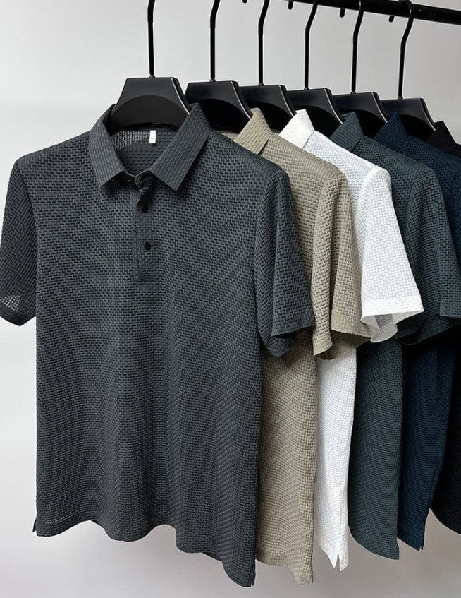 "Strukturiertes Poloshirt Herren, atmungsaktiv, modernes Design, elegant, in Blau, Grau, Khaki, Schwarz, Weiß erhältlich."