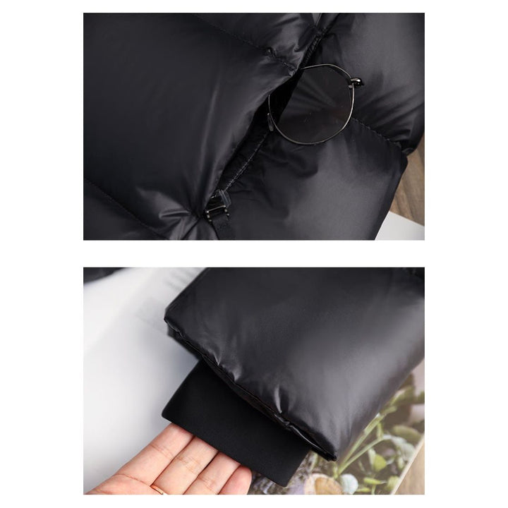 "Stylische Daunen-Winterjacke für Damen, wasserdicht, elegant, schwarze Farbe, hält warm und bietet optimalen Schutz."