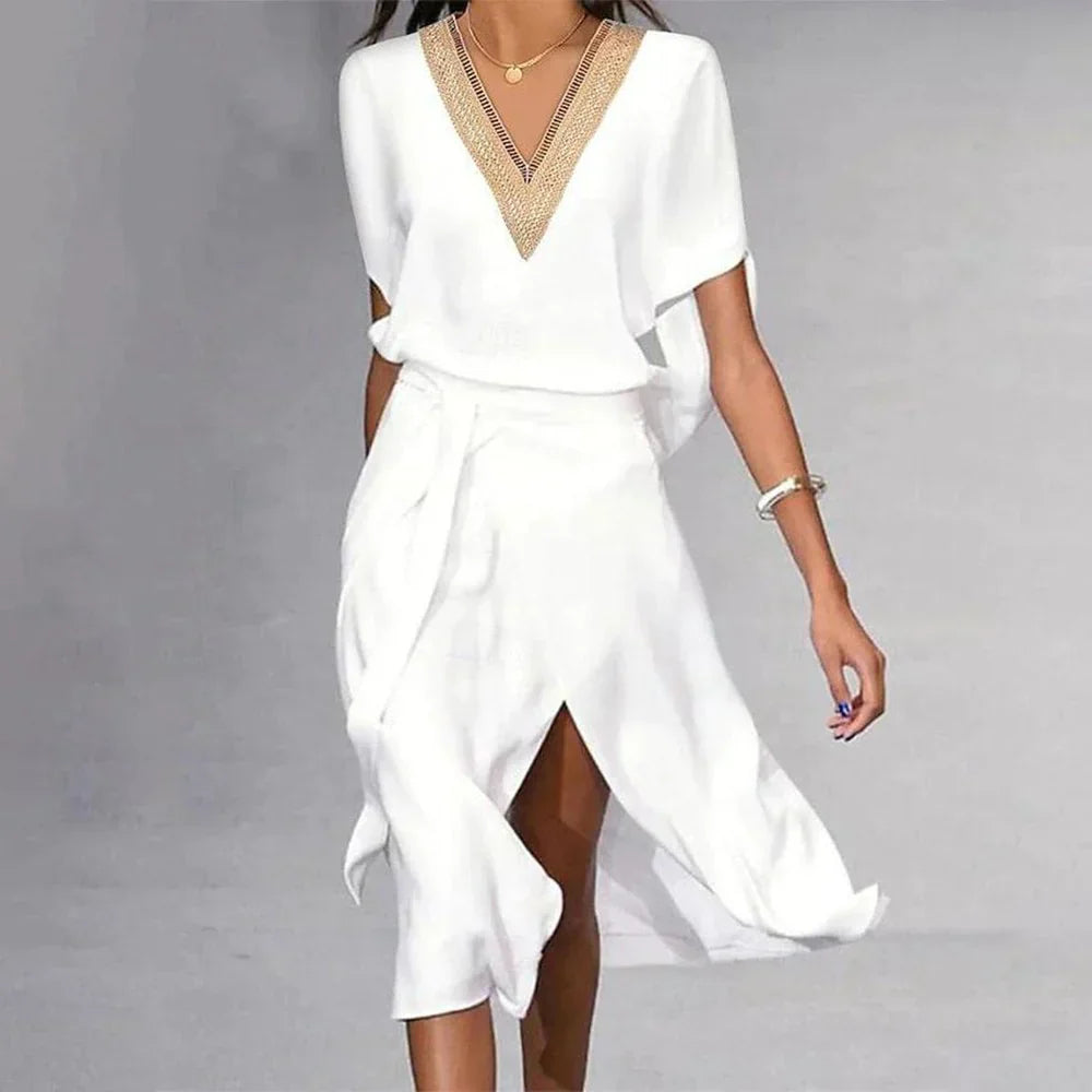 Stylisches weißes Midikleid mit V-Ausschnitt aus hochwertigen Materialien, zeitlos elegant und vielseitig für Damen.