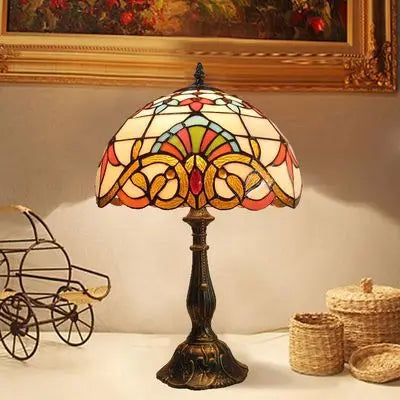 "Tiffany Tischlampe mit buntem Glas, elegantes Design, verstellbarer Schwanenhals, ideal für gemütliche Beleuchtung."