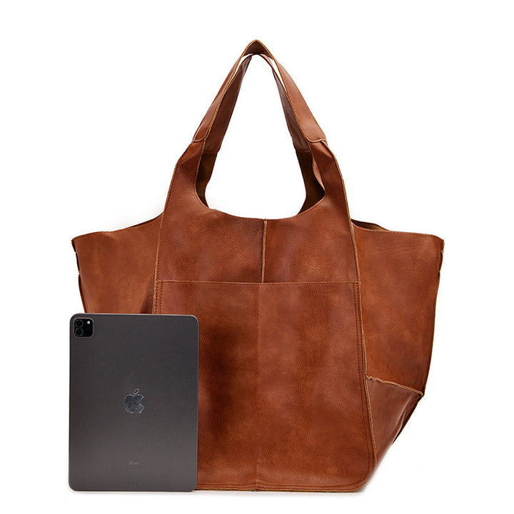 "Übergroße elegante Leder-Weekender-Handtasche mit modernem Design in vielseitigen Farben, perfekte Damen-Bag."