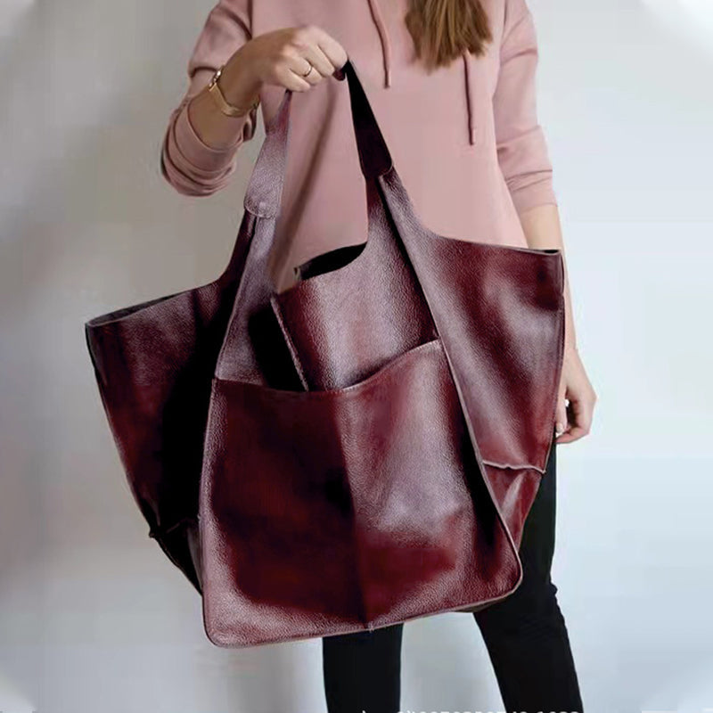 "Übergroße elegante Leder-Weekender-Handtasche mit modernem Design in vielseitigen Farben, perfekte Damen-Bag."