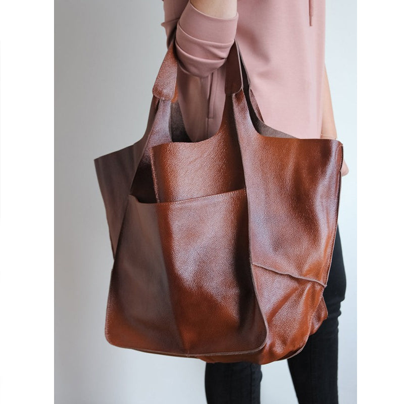 "Übergroße elegante Leder-Weekender-Handtasche mit modernem Design in vielseitigen Farben, perfekte Damen-Bag."