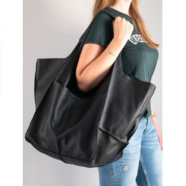 "Übergroße elegante Leder-Weekender-Handtasche mit modernem Design in vielseitigen Farben, perfekte Damen-Bag."