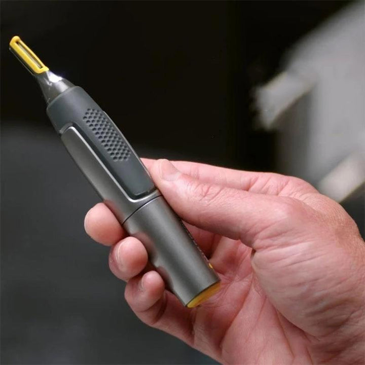 "Ultradünner Präzisionstrimmer mit Metallklingen, graues Design, ergonomisch für präzises Trimmen von Ohren und Nase."