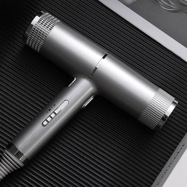 "Ultraleichter Haartrockner mit 1100W; stilvoll, ergonomisch, in Grau, Rot, Schwarz; für schnelles, glänzendes Haar."