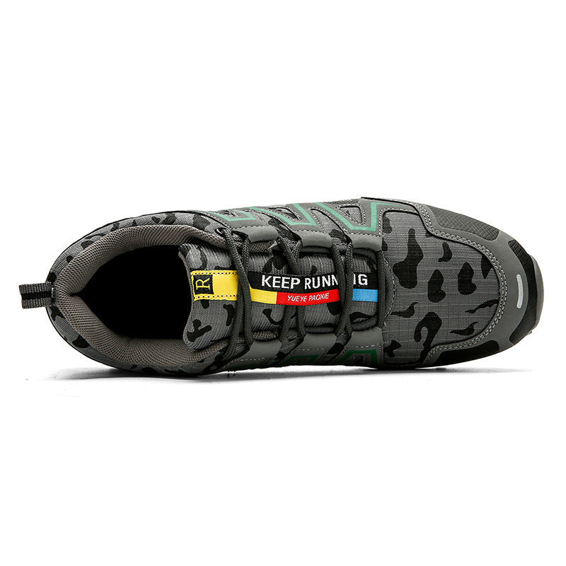 Unisex orthopädischer Lauf- und Wanderschuh, dunkelgrau, mit atmungsaktivem Obermaterial und rutschfester Sohle.