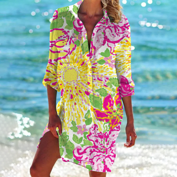 "Valencia Sommerkleid Damen in A-Linie mit floralen Designs, leuchtende Farben, ideal für Gartenpartys und Sommerabende."