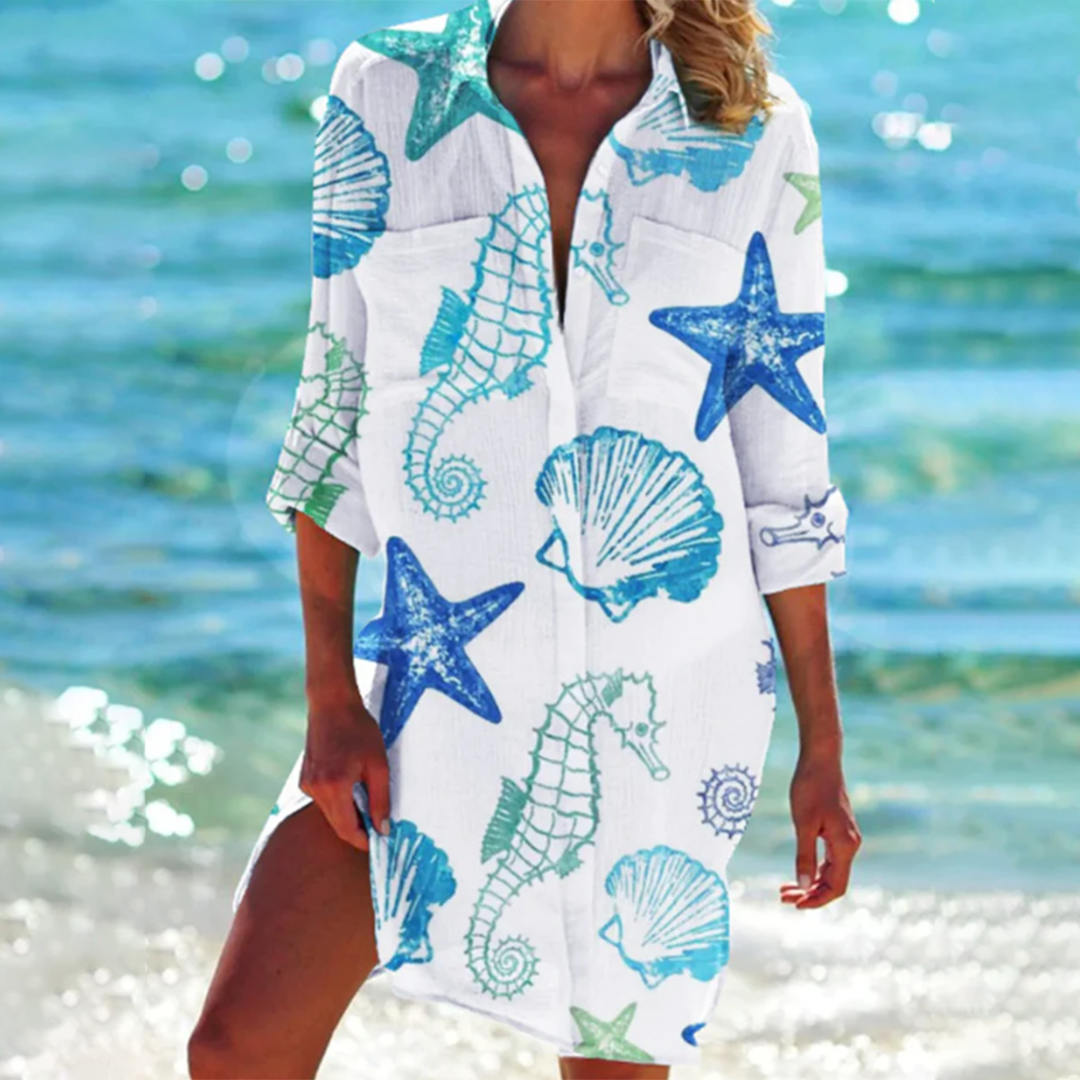 "Valencia Sommerkleid Damen in A-Linie mit floralen Designs, leuchtende Farben, ideal für Gartenpartys und Sommerabende."