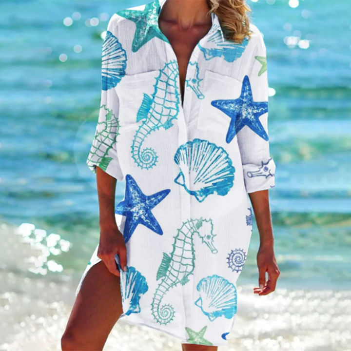 "Valencia Sommerkleid Damen in A-Linie mit floralen Designs, leuchtende Farben, ideal für Gartenpartys und Sommerabende."