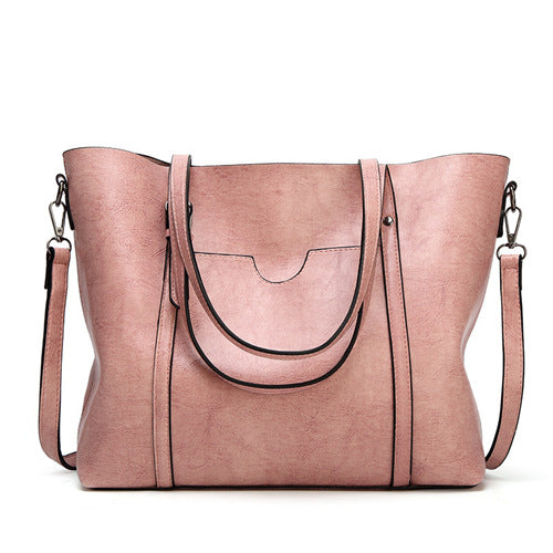 "Vegan lederhandtasche, stilvoll und geräumig mit handgefertigten Details, robuste Griffe, elegantes Design, Damenmode."
