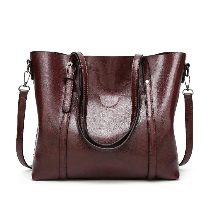 "Vegan lederhandtasche, stilvoll und geräumig mit handgefertigten Details, robuste Griffe, elegantes Design, Damenmode."