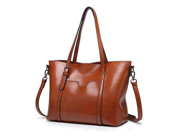 "Vegan lederhandtasche, stilvoll und geräumig mit handgefertigten Details, robuste Griffe, elegantes Design, Damenmode."