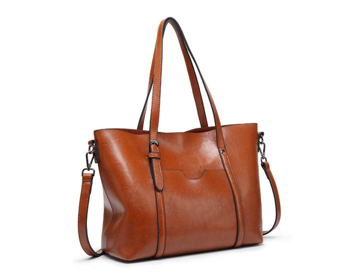 "Vegan lederhandtasche, stilvoll und geräumig mit handgefertigten Details, robuste Griffe, elegantes Design, Damenmode."