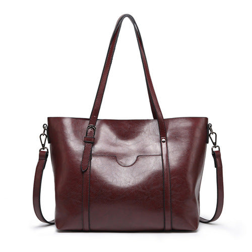 "Vegan lederhandtasche, stilvoll und geräumig mit handgefertigten Details, robuste Griffe, elegantes Design, Damenmode."