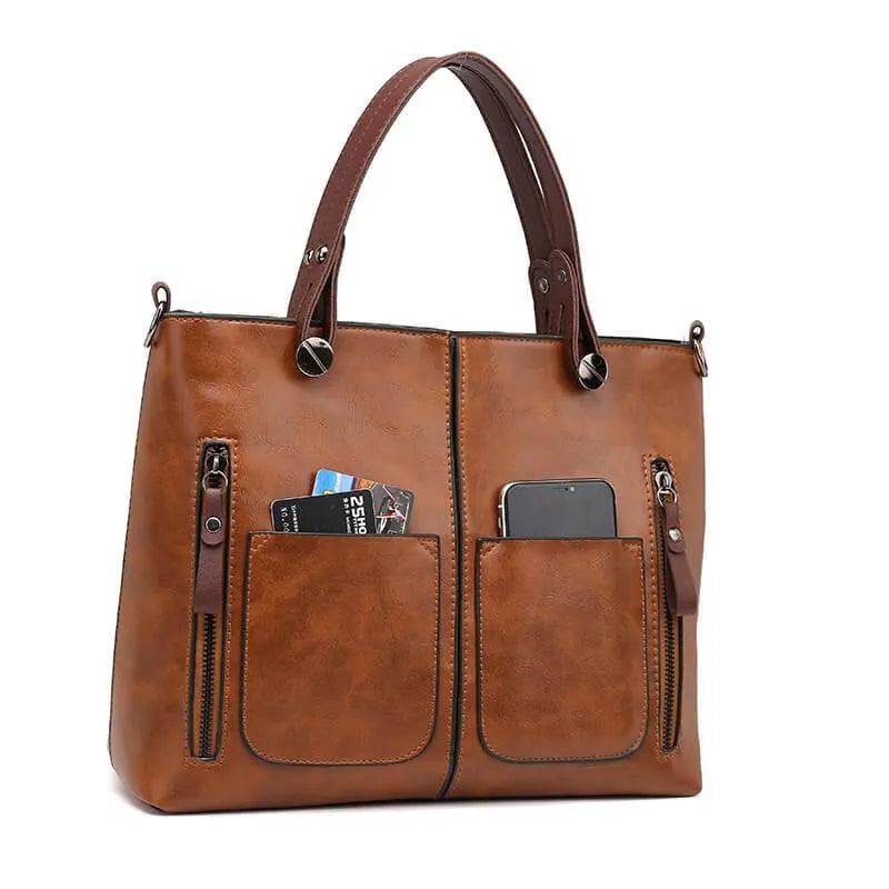 Veronica Ledertasche Vorderansicht: Elegante, braune Umhängetasche aus feinem Leder mit verstellbarem Riemen und Magnetversch