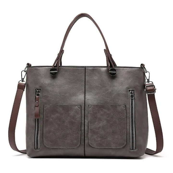 Veronica Ledertasche Vorderansicht: Elegante, braune Umhängetasche aus feinem Leder mit verstellbarem Riemen und Magnetversch