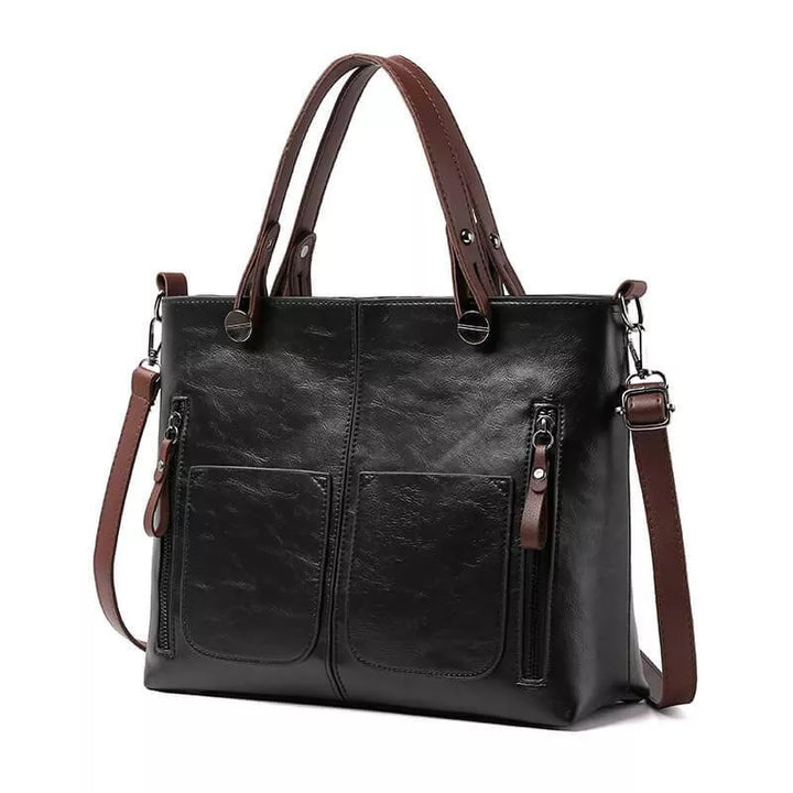 Veronica Ledertasche Vorderansicht: Elegante, braune Umhängetasche aus feinem Leder mit verstellbarem Riemen und Magnetversch