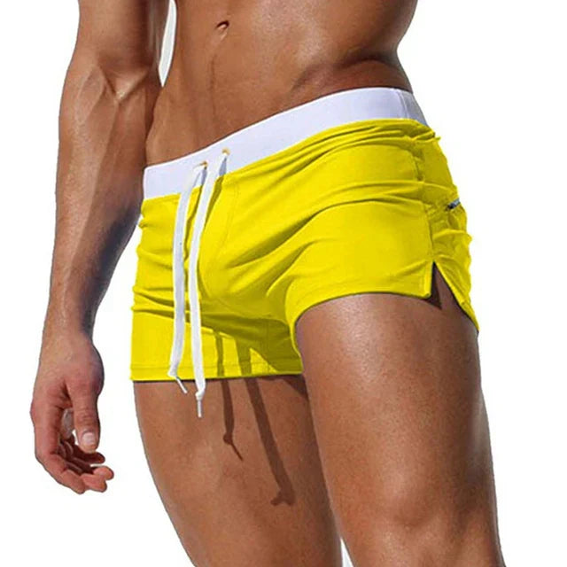 "Vielseitige Herren Badehose, schnell trocknend, komfortabel, blaues Design, ideal für Strand und Wasserabenteuer."
